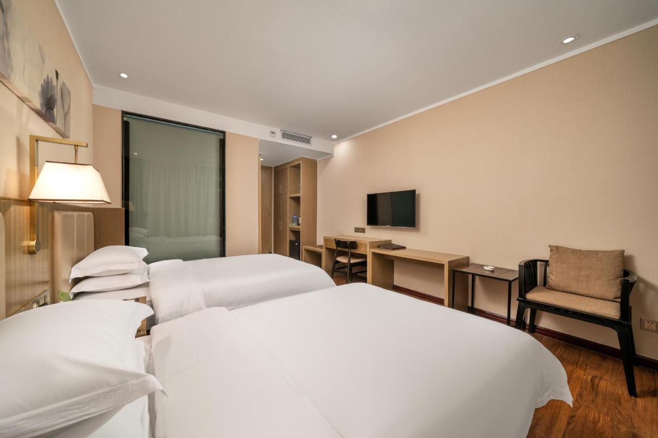 กวางโจว ป๋ออี้ โฮเทล Hotel ภายนอก รูปภาพ