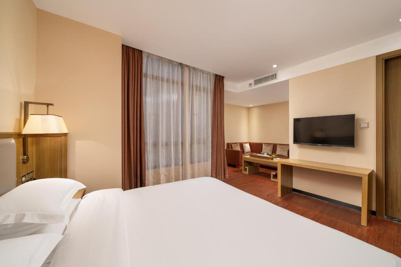 กวางโจว ป๋ออี้ โฮเทล Hotel ภายนอก รูปภาพ