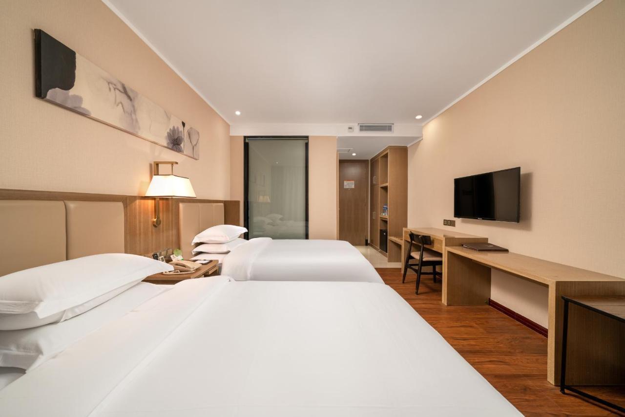 กวางโจว ป๋ออี้ โฮเทล Hotel ภายนอก รูปภาพ