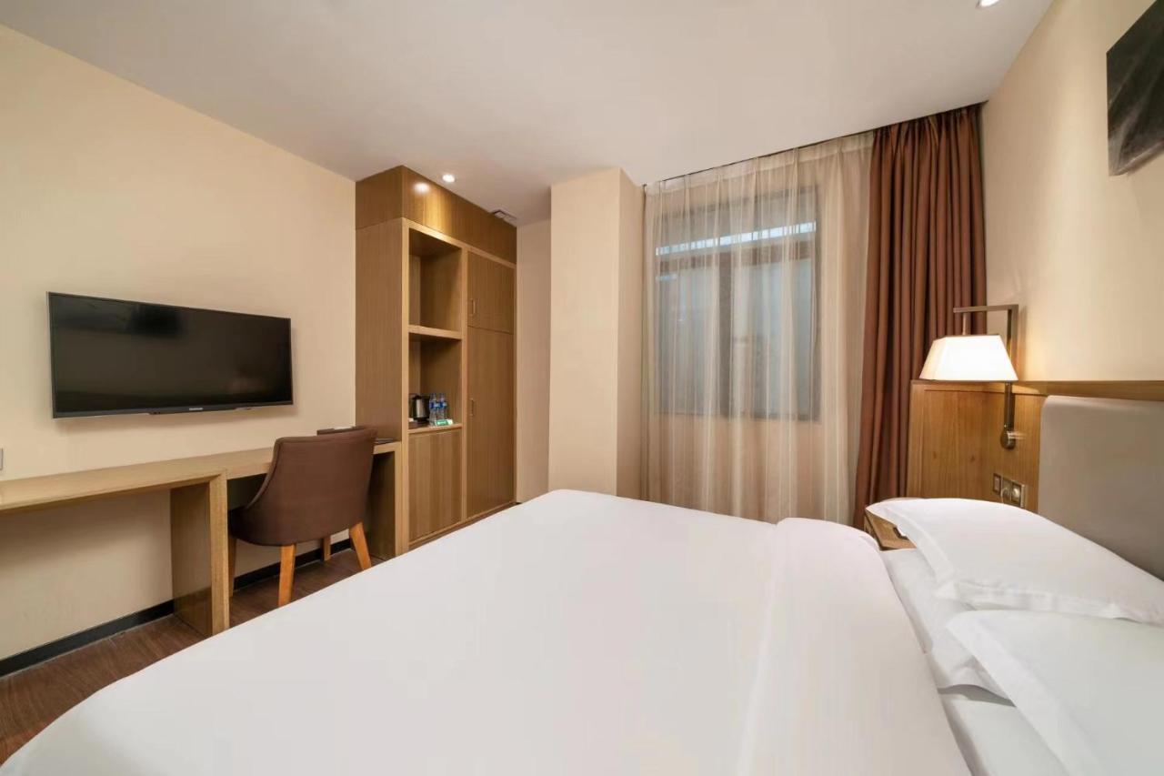 กวางโจว ป๋ออี้ โฮเทล Hotel ภายนอก รูปภาพ