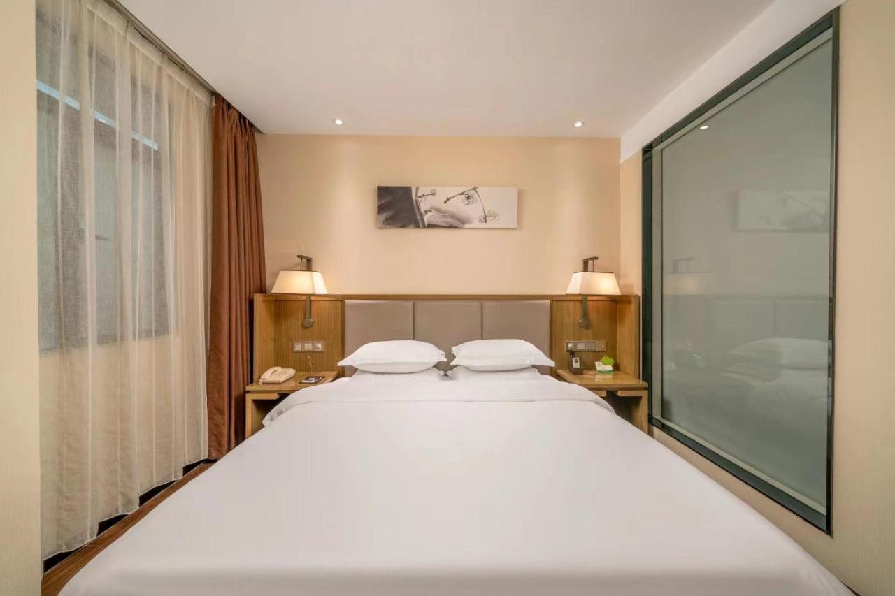 กวางโจว ป๋ออี้ โฮเทล Hotel ภายนอก รูปภาพ