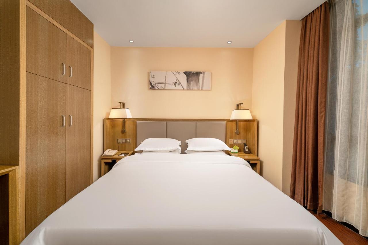 กวางโจว ป๋ออี้ โฮเทล Hotel ภายนอก รูปภาพ