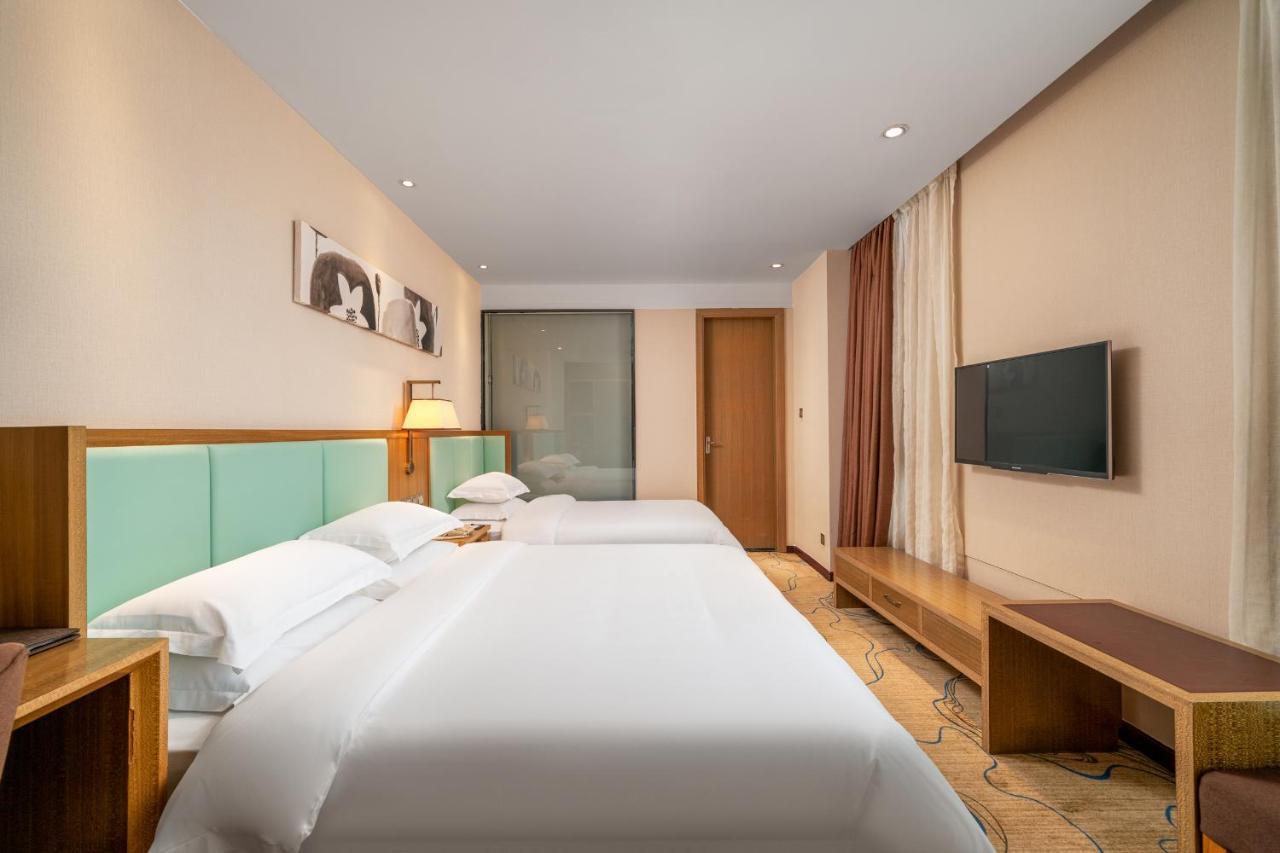 กวางโจว ป๋ออี้ โฮเทล Hotel ภายนอก รูปภาพ